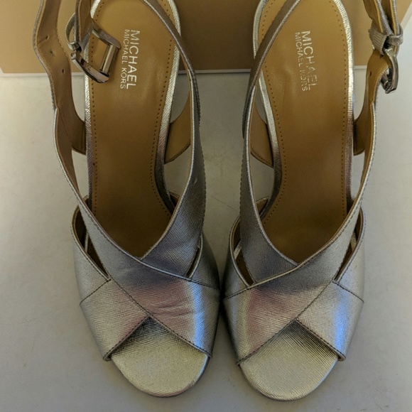 Michael Kors Shoes - Michael Kors silver heels size 9. 5